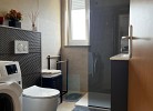 Badezimmer mit Waschmaschine