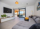 Wohnzimmer mit Ausgang auf die Terrasse