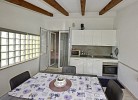 Küche, Esstisch und Loggia