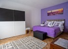 Schlafzimmer 1 mit Bad en Suite