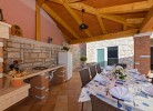 Überdachte Terrasse mit Grillplatz