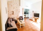 Wohnzimmer mit Ausgang zur Terrasse
